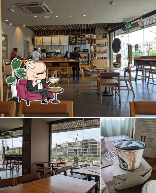 Take a seat at one of the tables at Starbucks
