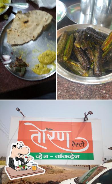 This is the picture showing food and exterior at Toran Restaurant