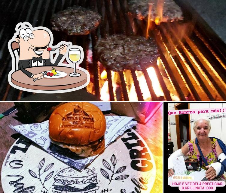 A ilustração da comida e interior no Grill Nota Mil
