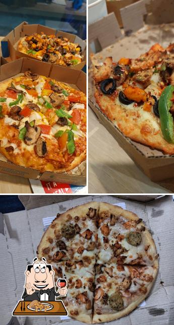 At Domino's Pizza Behala , Kolkata, you can get pizza