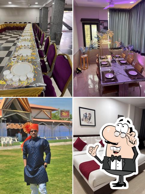 Take a seat at one of the tables at Hotel Pushpanjali