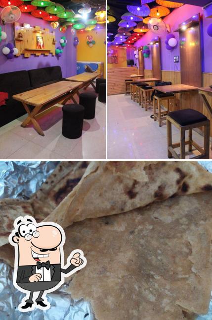 Check out the image displaying interior and food at FoodChacha