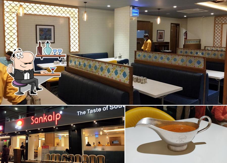 Take a look at the image showing interior and food at Sankalp - The Taste of South