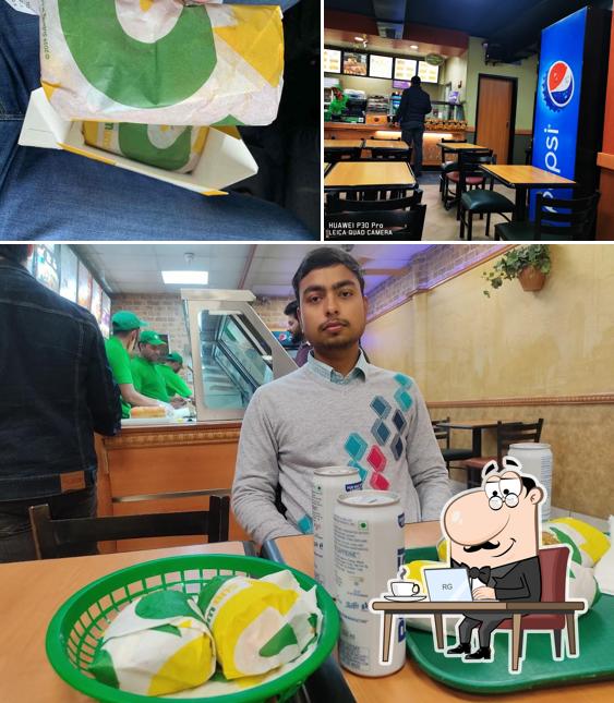 Take a seat at one of the tables at Subway Patiala leela bhawan