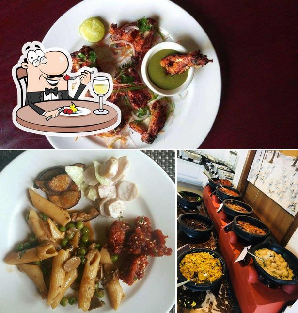 Meals at Blue Bell Multi Cuisine Restaurant - Flora Airport Hotel