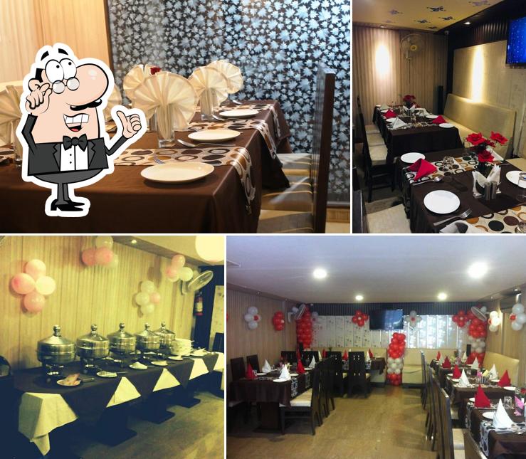 Take a seat at one of the tables at Niwala Restaurant