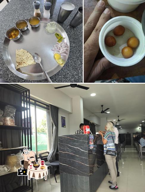 This is the photo displaying food and interior at JAY SWADISHT GUJRATI THALI NAVSARI