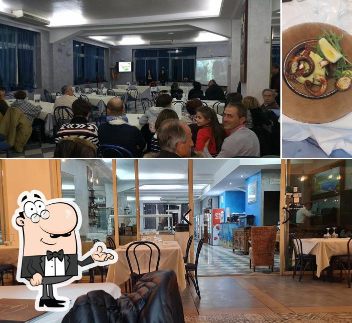 Guarda la immagine che mostra la interni e bevanda di Ristorante Aquarium