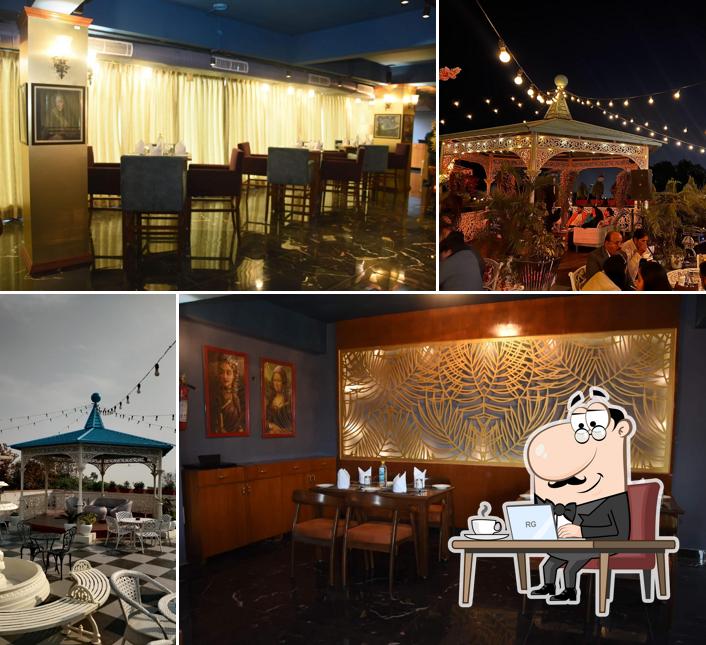 Take a seat at one of the tables at Auric Restaurant & Rooftop Cafe