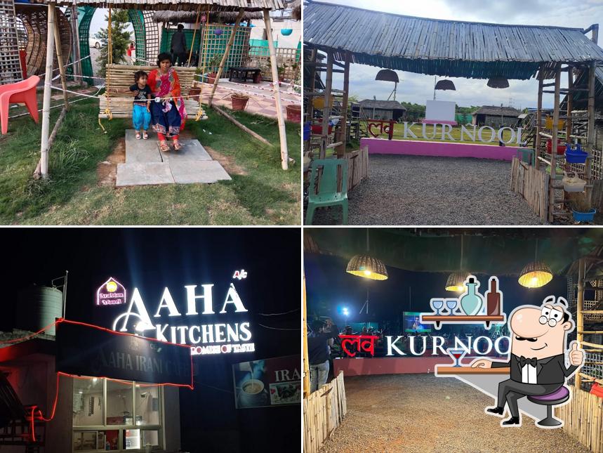 Take a seat at one of the tables at AAHA KITCHENS(PROMISE OF TASTE)