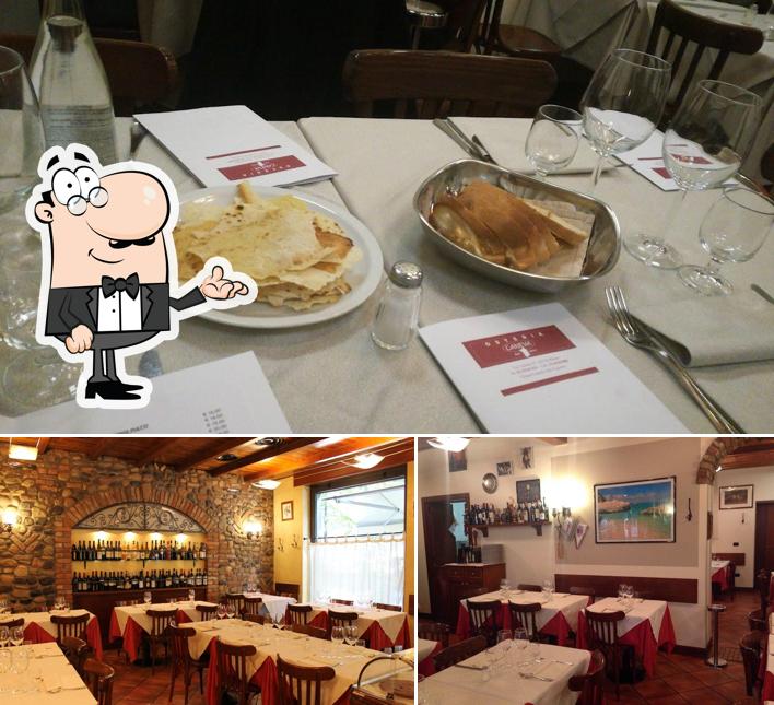 Dai un'occhiata agli interni di Osteria Caneva – Ristorante di Pesce e Cucina Sarda a Milano