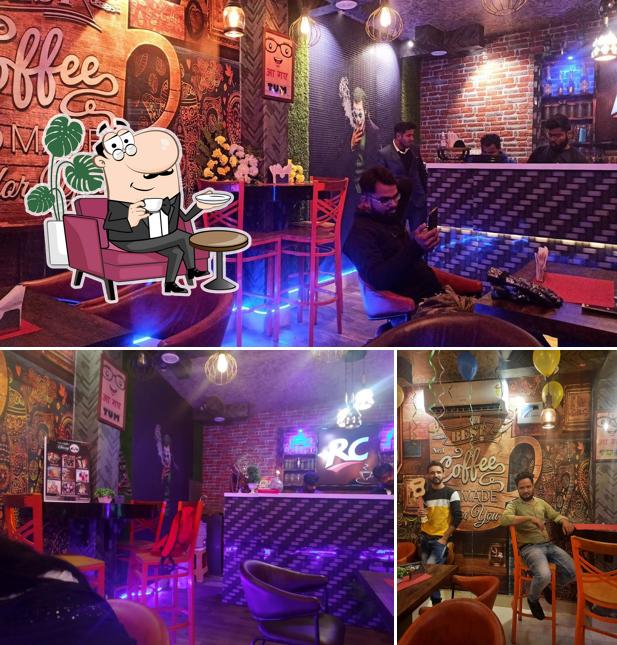 Take a seat at one of the tables at Tanushree Plaza