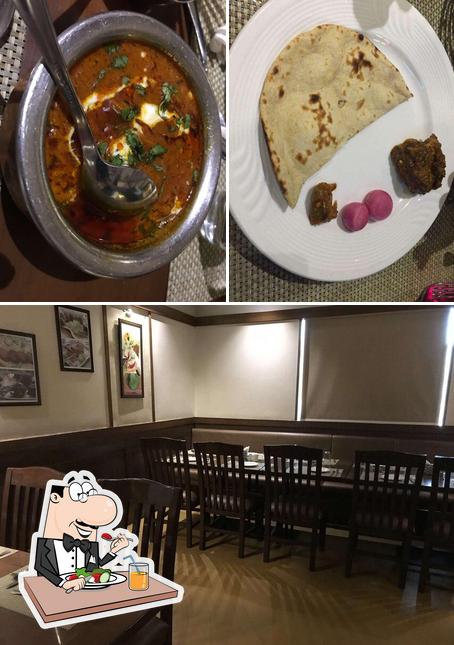 The photo of food and interior at Rasraj