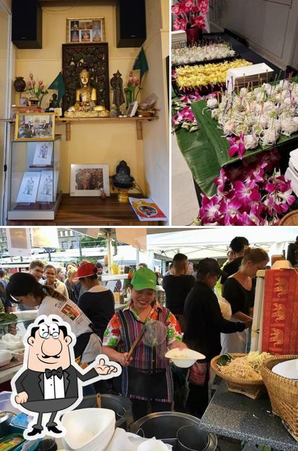 La immagine di interni e cibo da Les Délices du Siam