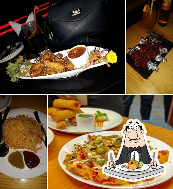 Chicken wings, pad thai and nachos at EMBASSY CLUB & SKY LOUNGE