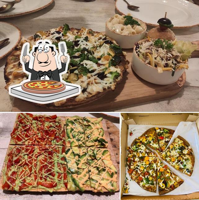 Try out pizza at Sante Spa Cuisine BKC