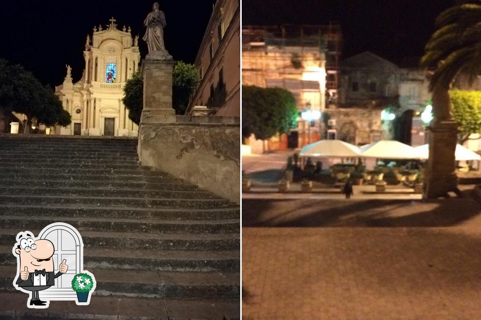 Puoi goderti l'aria fresca da seduto all'esterno di Pizzeria Mille e una notte