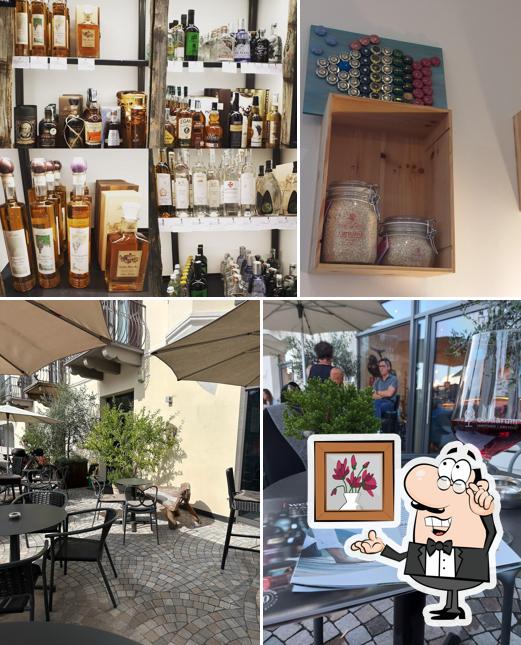 Dai un'occhiata agli interni di caldarum vinothek enoteca