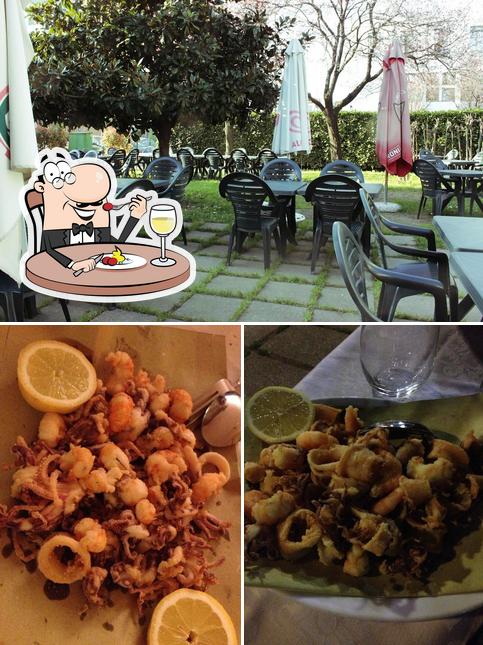 Trattoria Davis si caratterizza per la cibo e interni