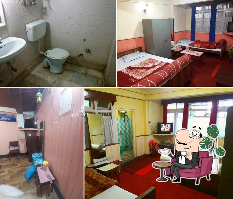 Take a seat at one of the tables at Hotel Dil