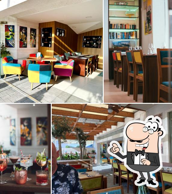 Dai un'occhiata agli interni di Merlin Bistro