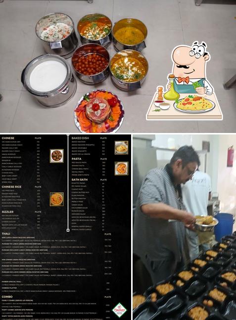Take a look at the picture displaying food and interior at Flavourz