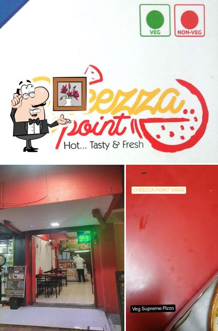 The interior of CHEEZZA POINT