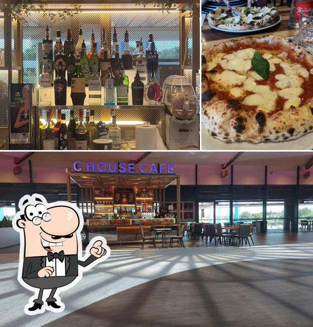 La foto della interni e pizza di C House Cafè