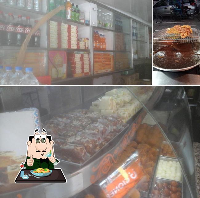 Check out the image displaying food and interior at Tomer Sweets & Snacks