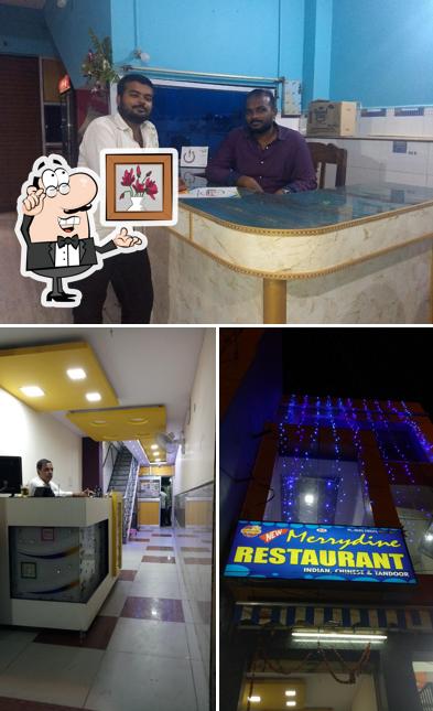 Take a seat at one of the tables at Merrydine Restaurant