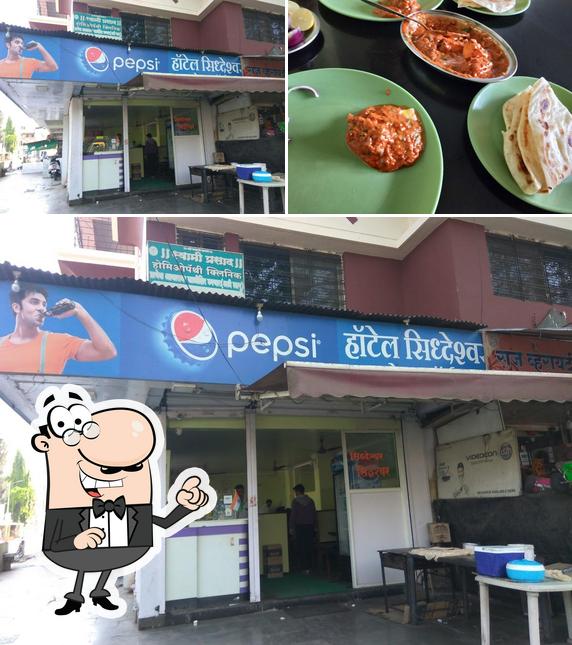 The image of interior and food at Hotel Siddheshwar Veg Corner
