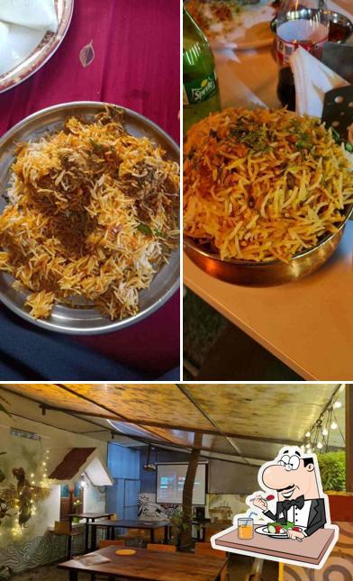 This is the photo showing food and interior at Natukodipakodi