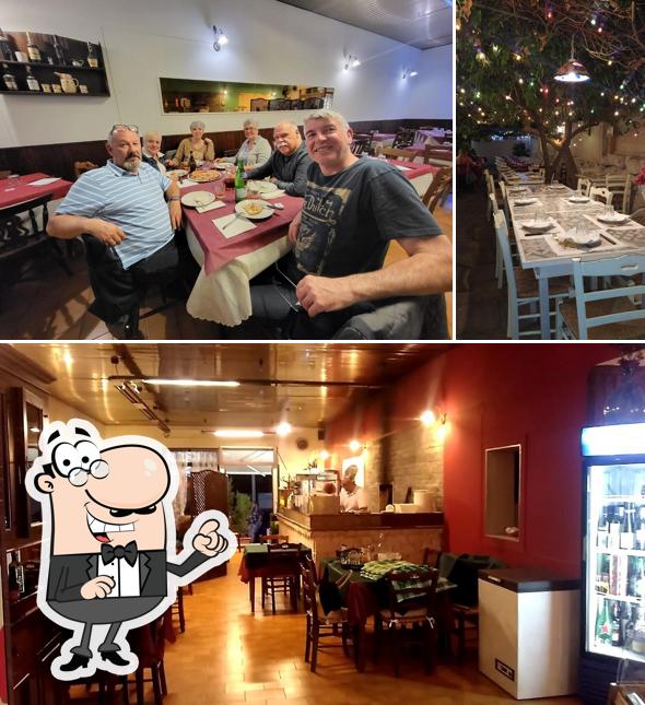 Dai un'occhiata agli interni di Mangia Fuoco Pizzeria Braceria