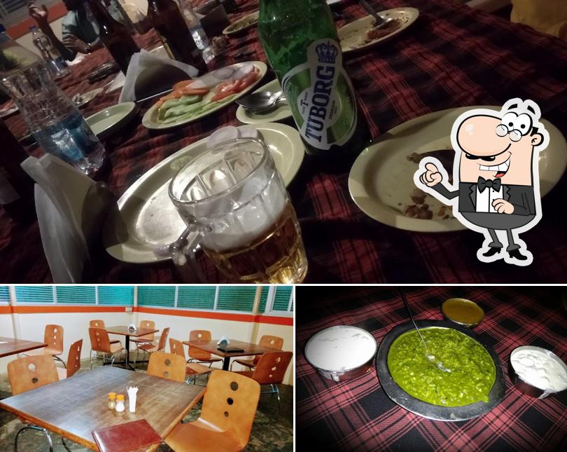 Check out the picture depicting interior and food at Inchara Dhabha