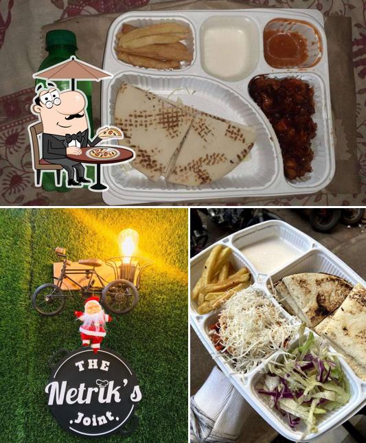 Check out the image showing exterior and beverage at The Netrik's Joint