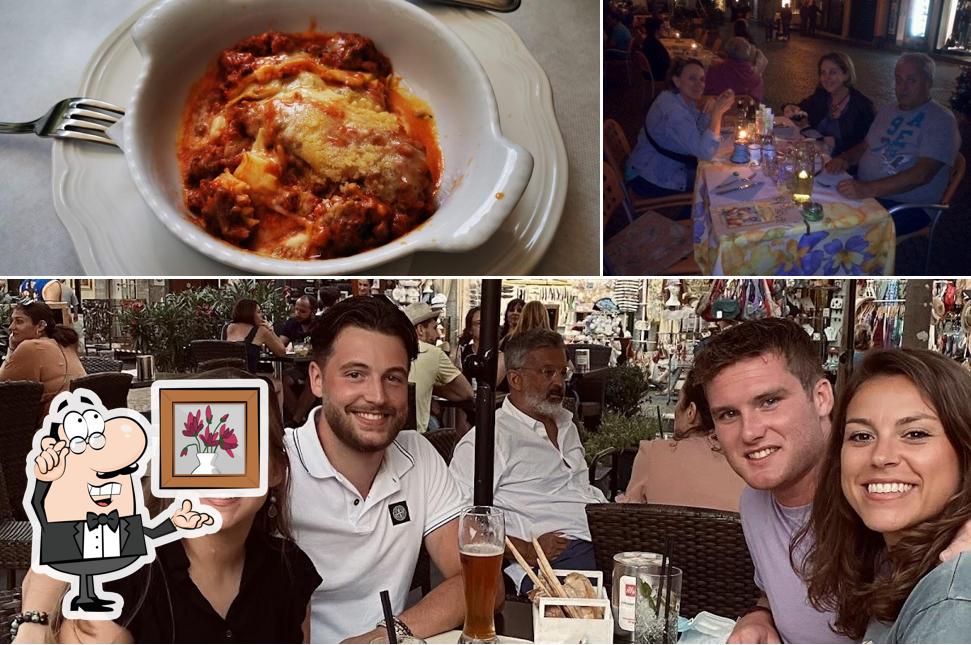 Questa è la foto che presenta la interni e cibo di Ristorante Pizzeria La Piazzetta