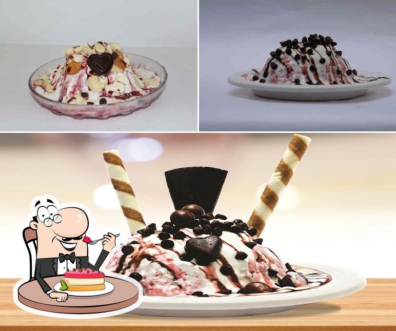 Raj Gola serves a selection of desserts
