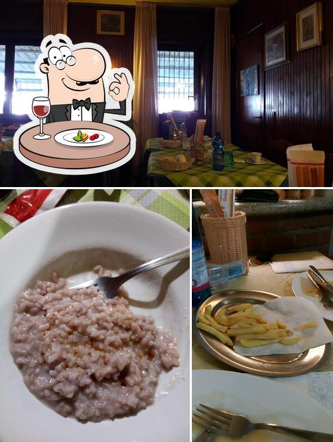 La immagine della cibo e tavolo da pranzo di Ristorante La Campagnola