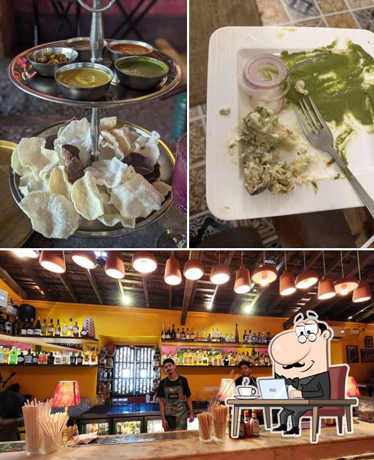 Take a seat at one of the tables at Jamun Goa