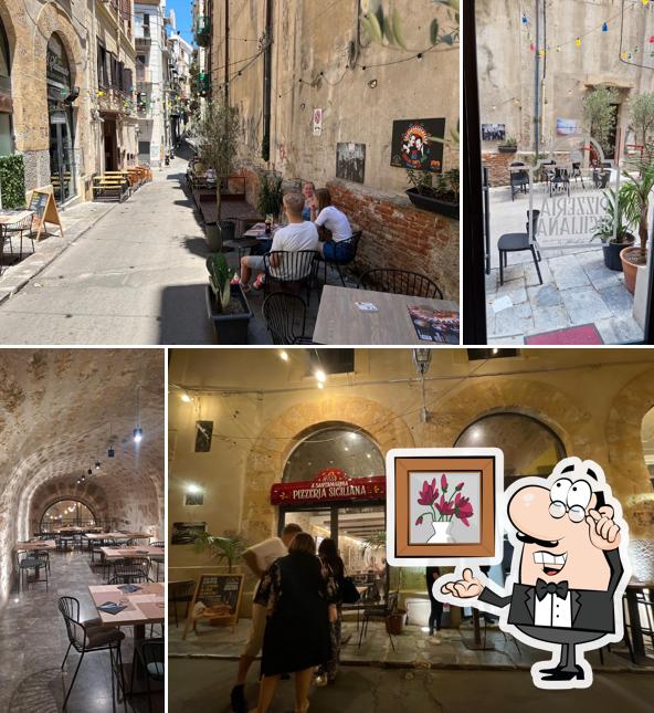 Siediti a un tavolo di Assud a Santamarina Pizzeria Siciliana