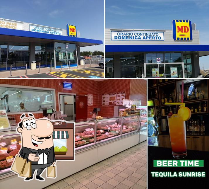 Questa è la immagine che presenta la esterno e cibo di MD S.p.A