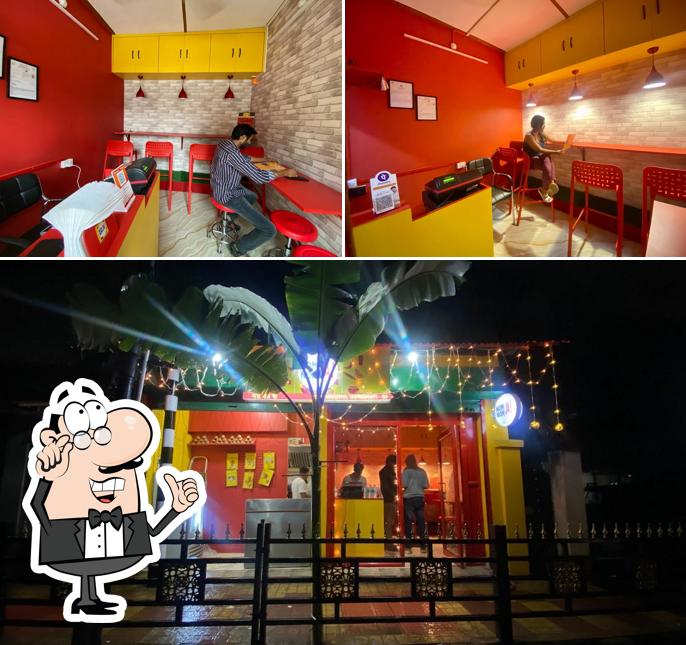The picture of interior and exterior at Nom Nom Ja, Chenikuthi