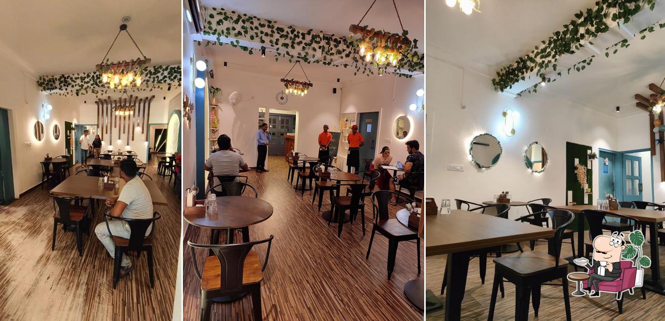 Take a seat at one of the tables at Tapori Tummy - Best Restaurant in Aliganj Lucknow