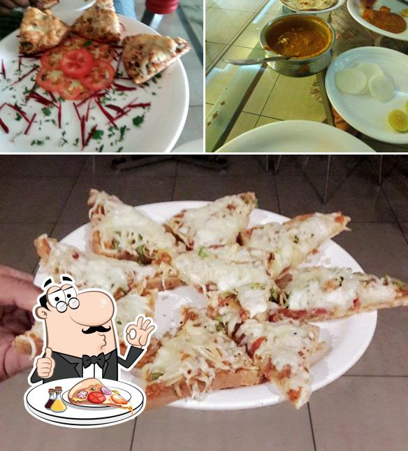 Pick pizza at Ruchida Restaurant
