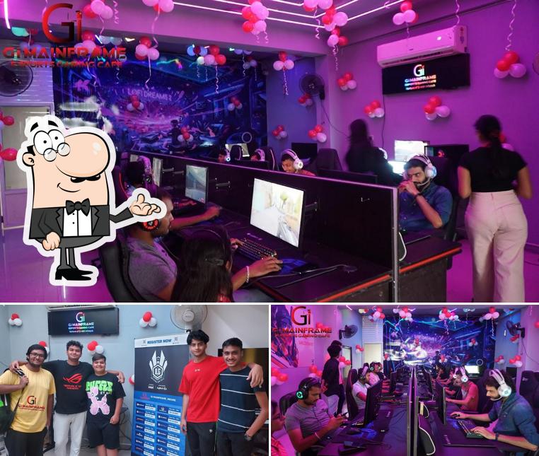 Take a seat at one of the tables at Gi Mainframe Esports Gaming Cafe