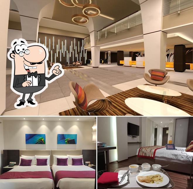 Take a seat at one of the tables at Grand Kakinada by GRT Hotels