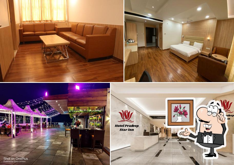 Take a seat at one of the tables at Hotel Pradeep Star Inn - Hotels Banquet Hall Best Hotel in Gorakhpur