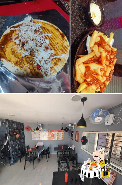 This is the picture showing food and interior at AFC PIZZA CORNER