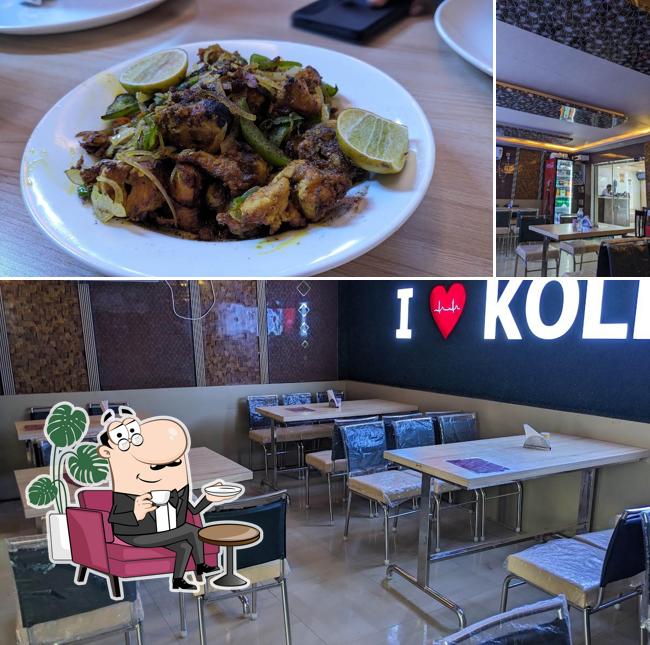 Take a look at the photo showing interior and food at HOT KATI ROLL & RESTAURANT