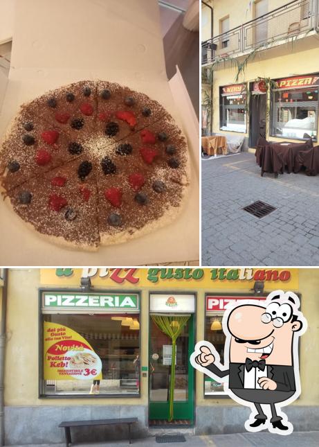 Dai un’occhiata alla foto che mostra la interni e cibo di Niky pizza